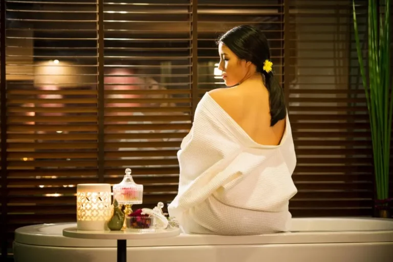 Relaxing Indoor Spa Setting with Bathtub and Wellness Items in Huai Khwang
