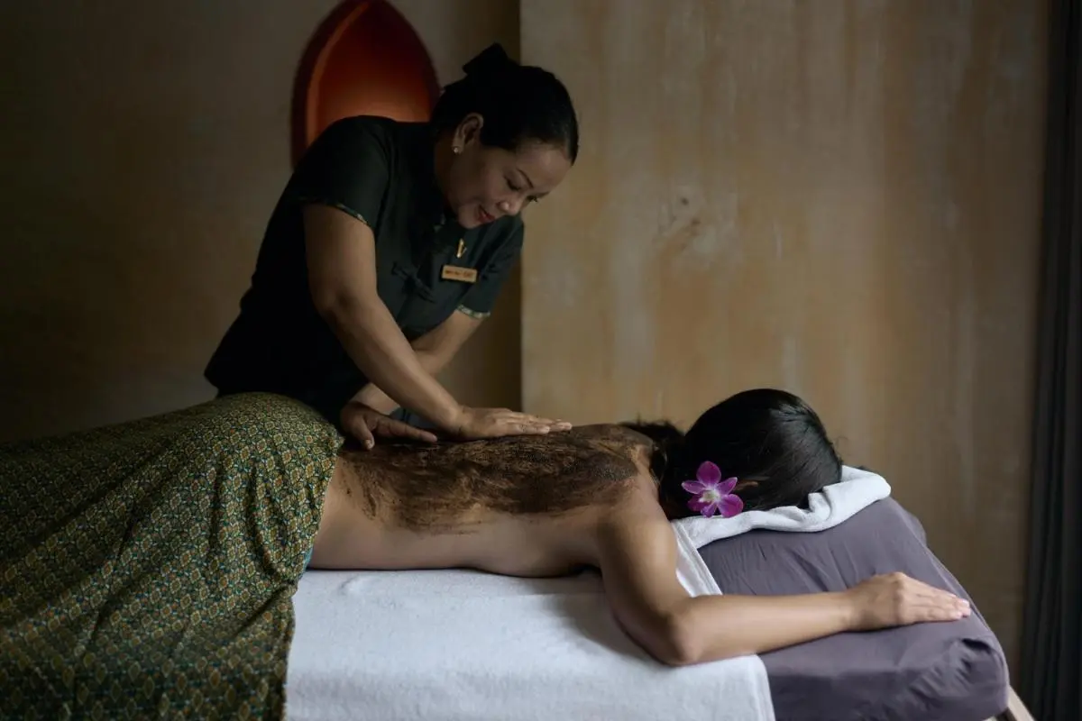 Relaxing Indoor Spa Treatment with Mud Therapy on Massage Table at Patong Beach