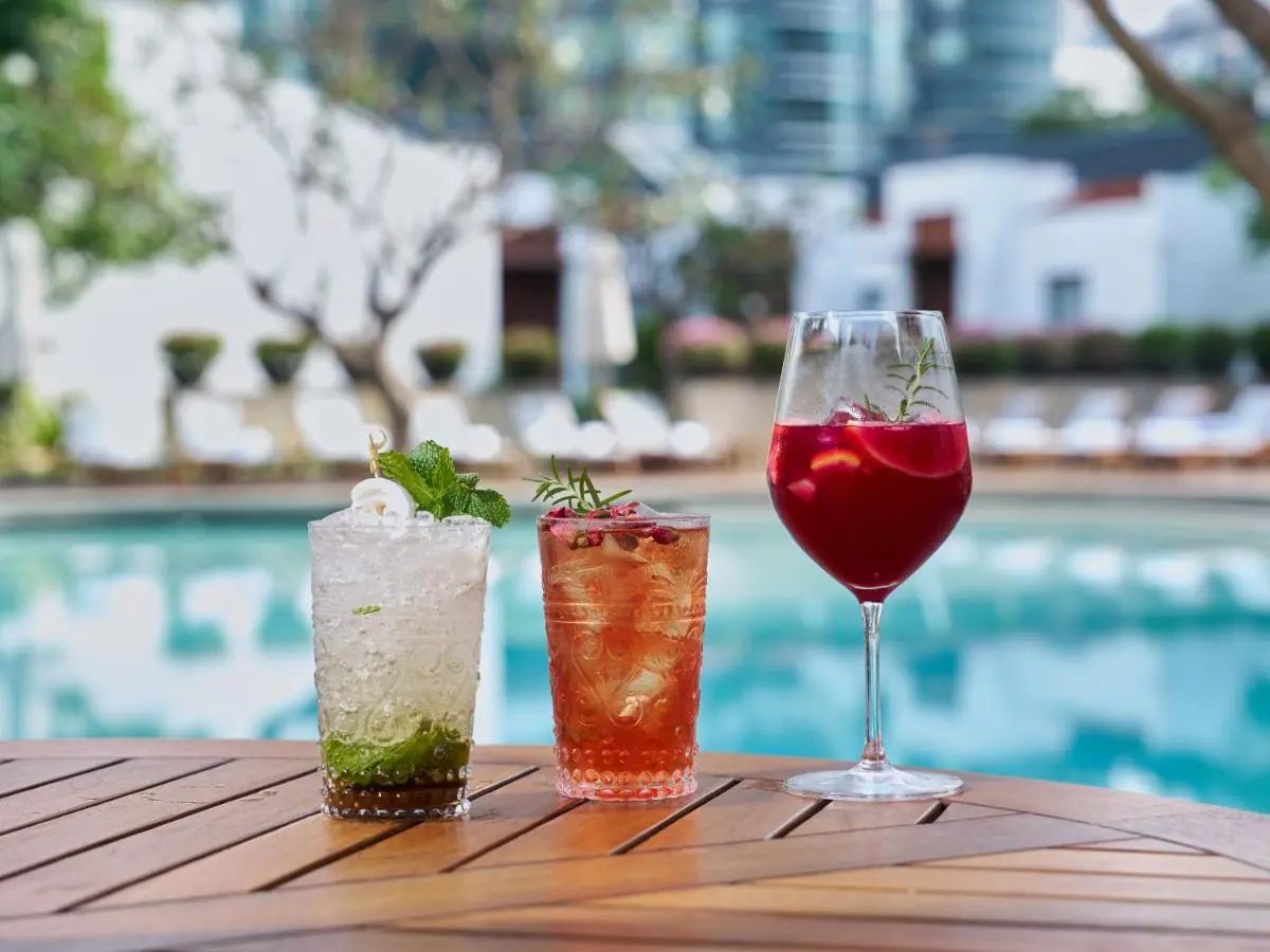 Grand Hyatt Erawan Bangkok Relaxing Poolside Setting with Beverages and Lounge Chairs in Pathumwan Bangkok Bangkok Province
