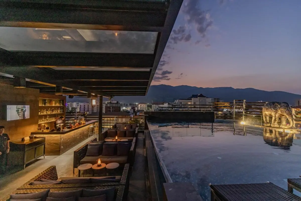 Chiang Mai Province Rooftop Infinity Pool and Lounge Area with City Views in Chiang Mai