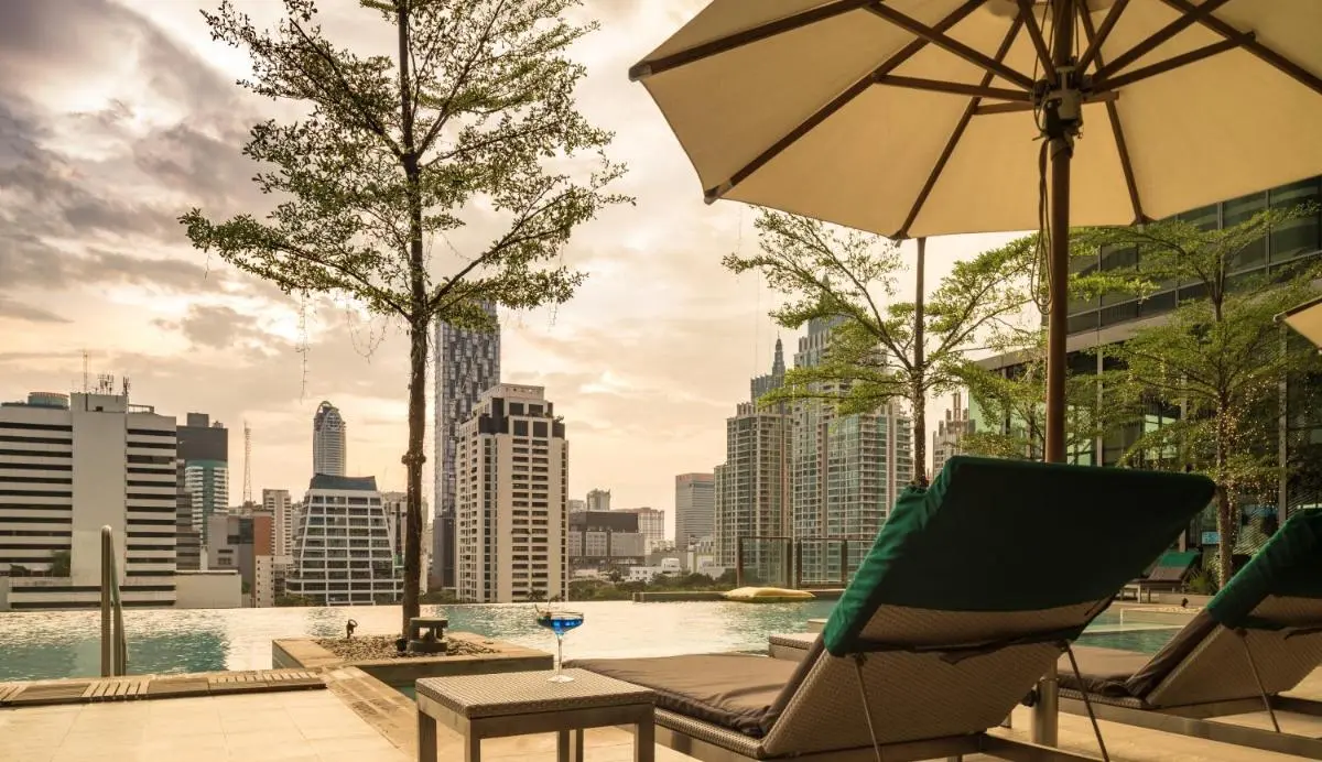Sivatel Bangkok Hotel Rooftop Infinity Pool and Lounge Area with Cityscape Views in Pathumwan Bangkok Bangkok Province