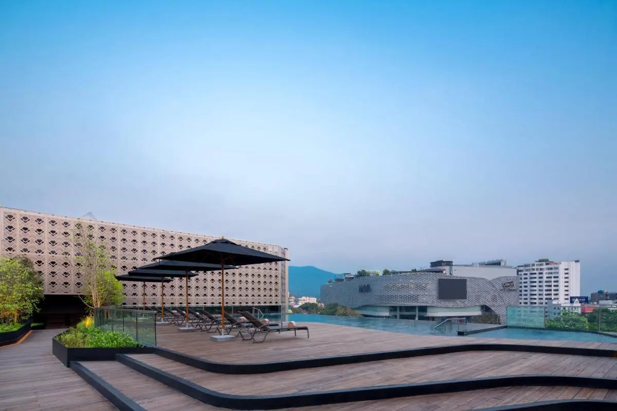 Rooftop Infinity Pool and Lounge Area with Mountain Views in Chiang Mai