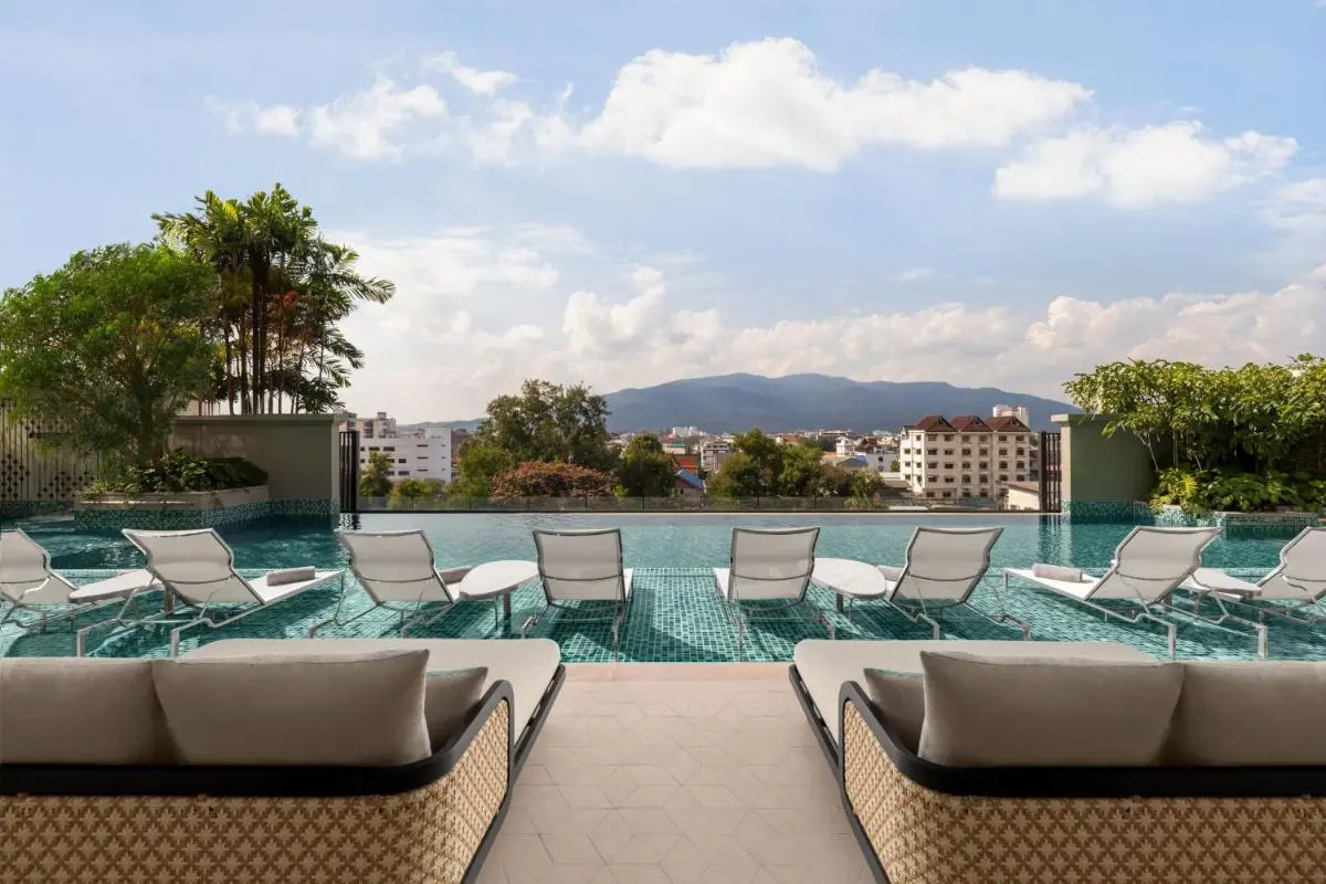 Chiang Mai Province Rooftop Infinity Pool and Lounge Area with Urban and Mountain Views in Chang Khlan Chiang Mai