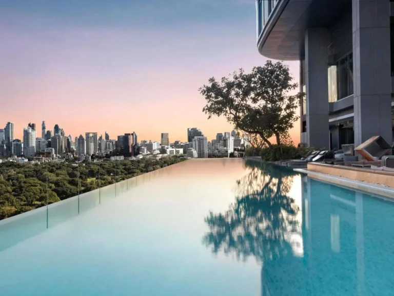 Rooftop Infinity Pool and Relaxation Area Overlooking Bangkok Skyline in Bang Rak