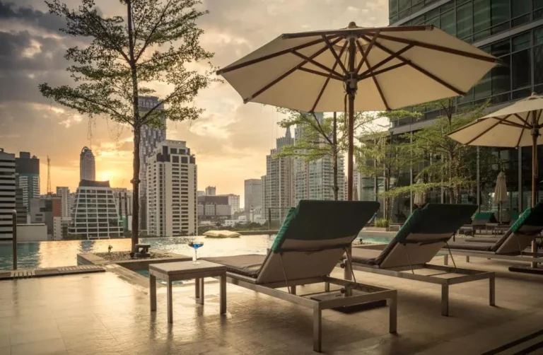 Rooftop Infinity Pool and Relaxation Area with City Views in Pathumwan Bangkok