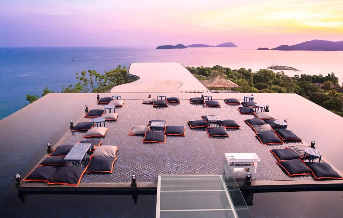 Sri Panwa Phuket Luxury Pool Villa Hotel Rooftop Infinity Pool with Scenic Ocean Views and Relaxing Seating at Panwa Beach