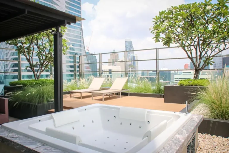 Rooftop Jacuzzi and Lounge Area with Cityscape Views in Pathumwan Bangkok