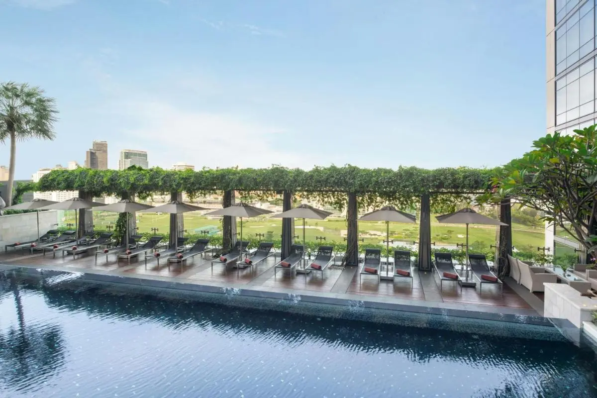 The St. Regis Bangkok Rooftop Outdoor Swimming Pool with Lounge Area and City View in Pathumwan Bangkok Thailand