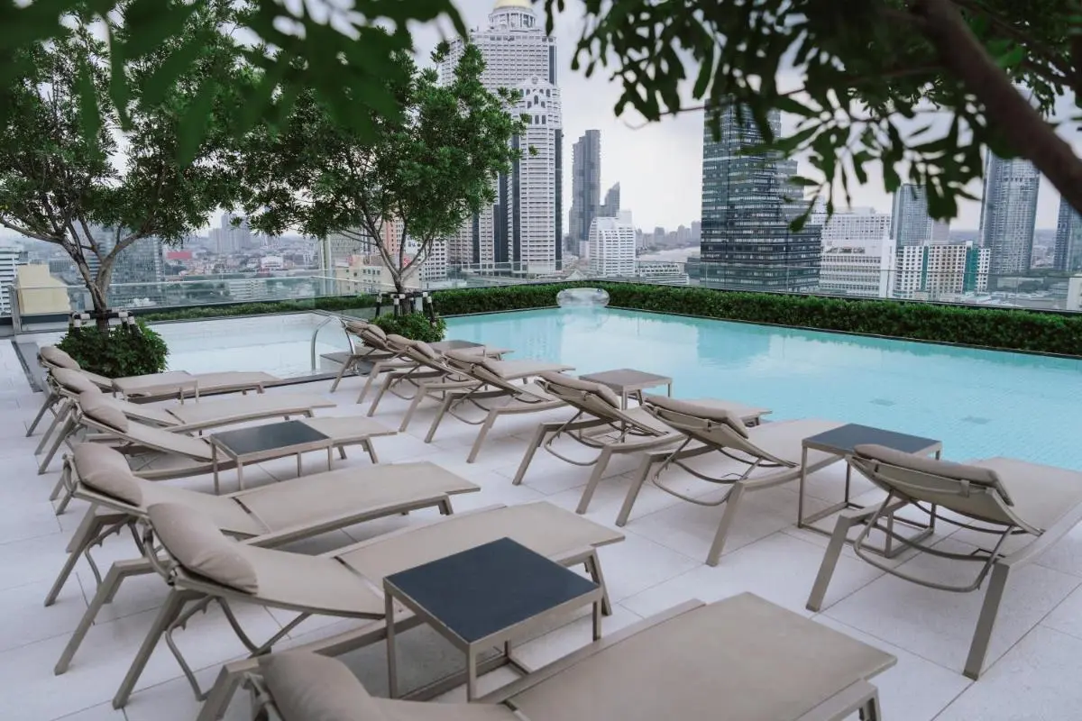 Grande Centre Point Surawong Bangkok Rooftop Pool and Relaxation Area with City Skyline Views in Bang Rak Bangkok