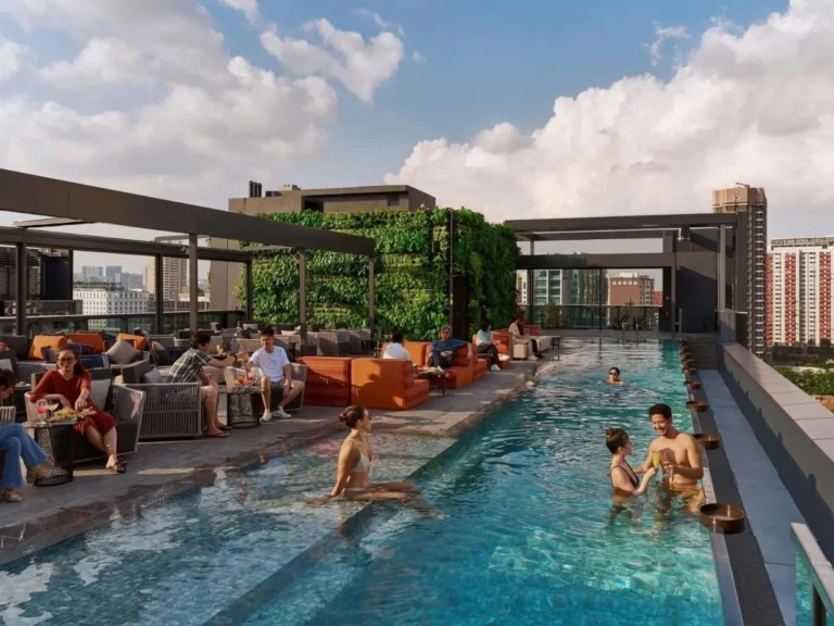 Rooftop Pool Area with Seating and Vertical Garden Near City Hall