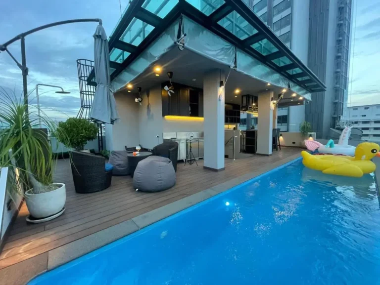 Rooftop Swimming Pool and Covered Seating Area with Inflatable Floats in Chang Khlan Chiang Mai Rooftop Swimming Pool and Covered Seating Area with Inflatable Floats in Chang Khlan Chiang Mai