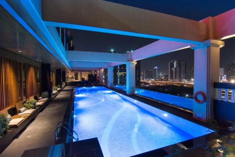 Rooftop Swimming Pool and Lounge Area with City Views in Huai Khwang Bangkok