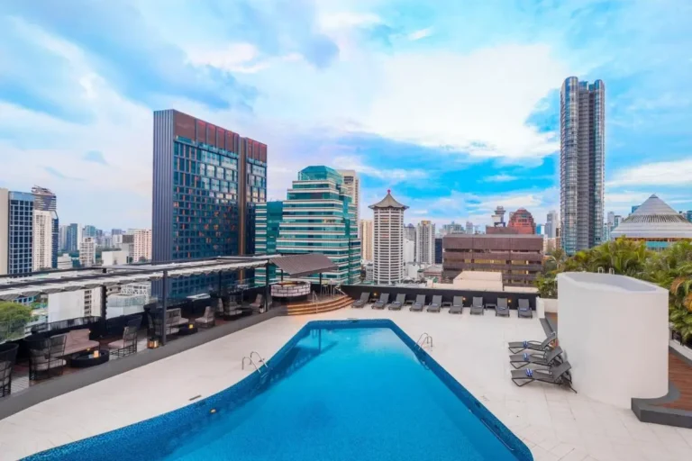 Rooftop Swimming Pool and Lounge Area with City Views in Orchard Singapore