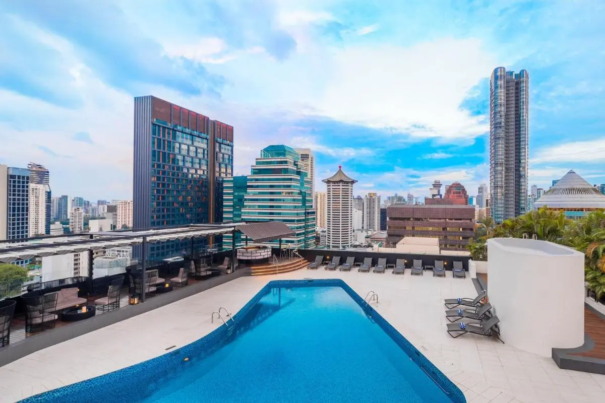 Rooftop Swimming Pool and Lounge Area with City Views in Orchard Singapore