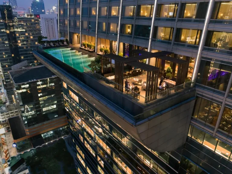 Rooftop Swimming Pool and Lounge Area with City Views in Pathumwan Bangkok