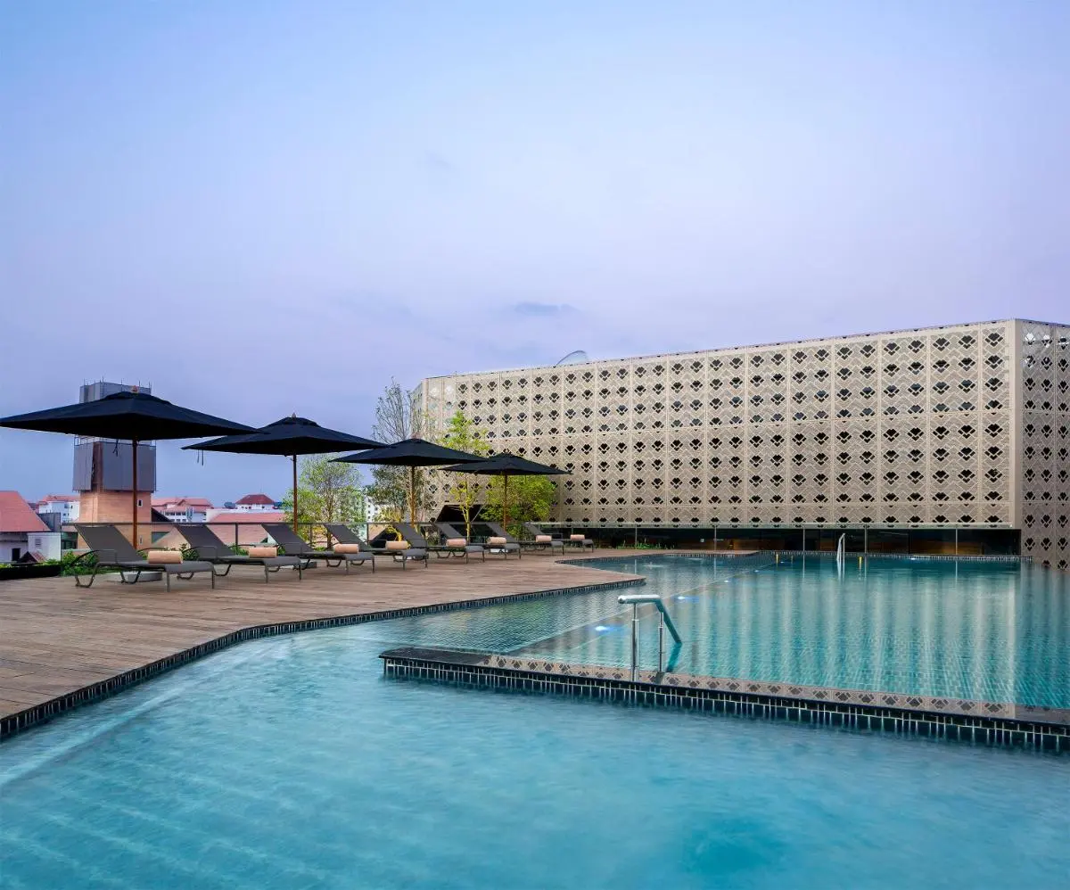 Rooftop Swimming Pool and Lounge Area with Clear Blue Water in Chiang Mai City