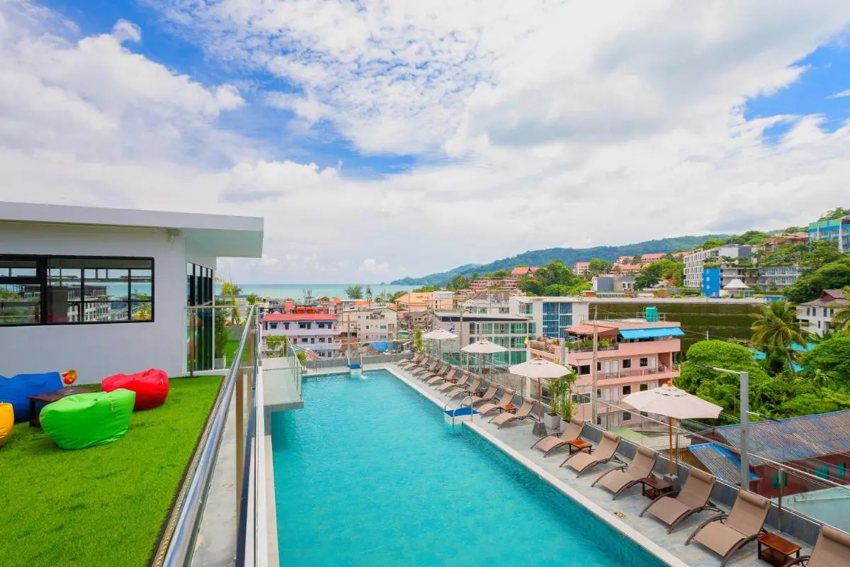 Rooftop Swimming Pool and Lounge Area with Ocean Views at Patong Beach
