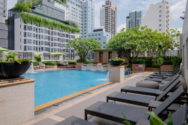 Rooftop Swimming Pool and Lounge Area with Urban Landscaping in Ratchathewi Bangkok