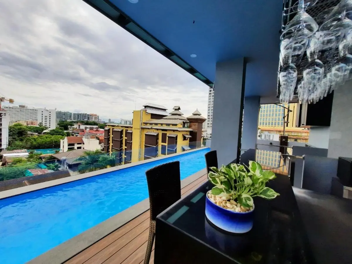 Rooftop Swimming Pool and Outdoor Seating Area with City Views in Chang Khlan Chiang Mai