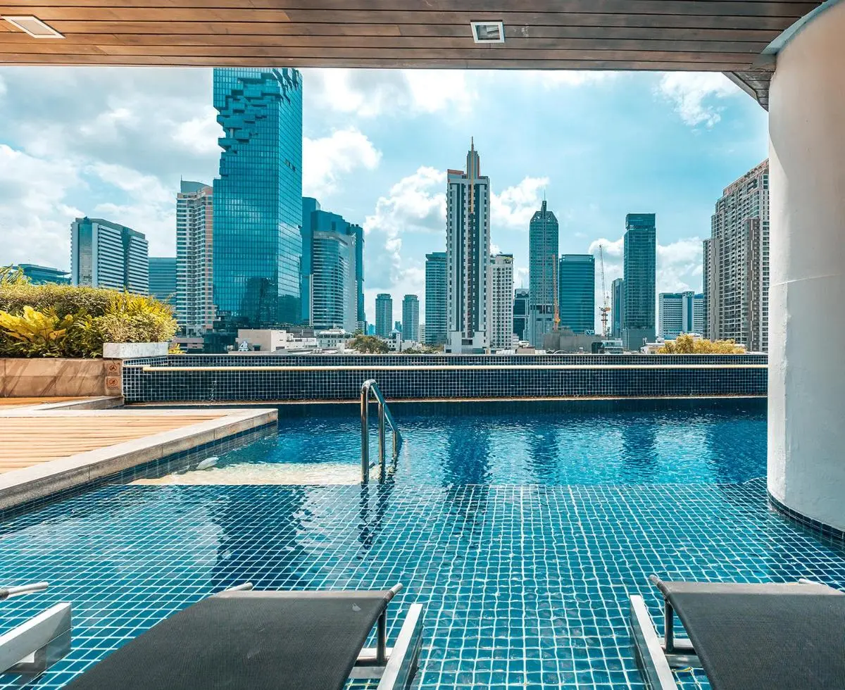 Rooftop Swimming Pool with City Skyline Views in Bang Rak Urban Area