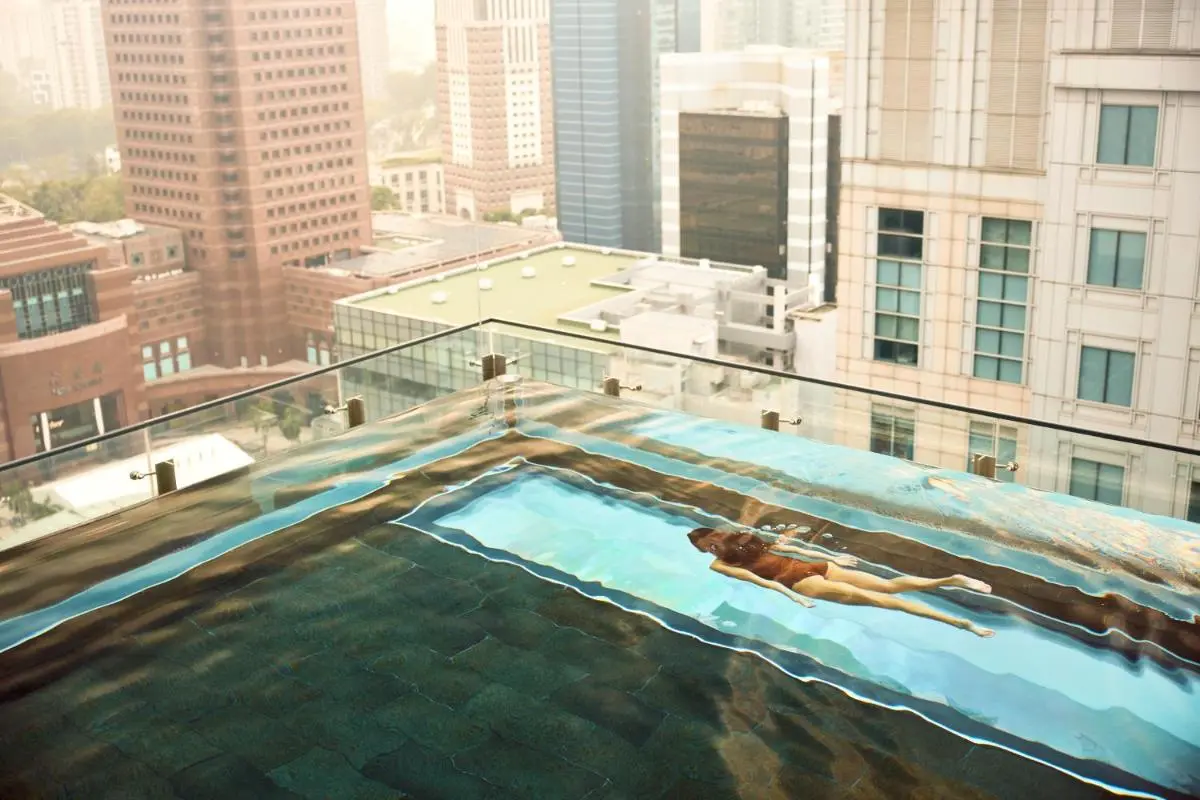 Rooftop Swimming Pool with City Views in Orchard Singapore Urban Setting