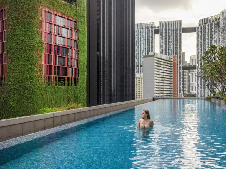 Rooftop Swimming Pool with Green Wall and City Views in Tanjong Pagar