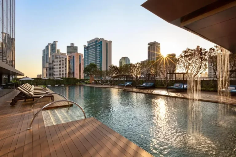 Rooftop Swimming Pool with Water Features and Urban Views in Wattana Bangkok