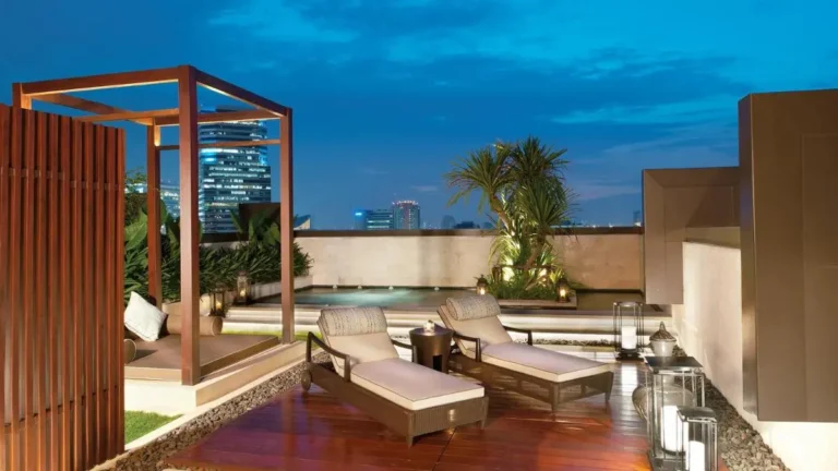 Rooftop Terrace with Jacuzzi and Lounge Area Overlooking Pathumwan Cityscape