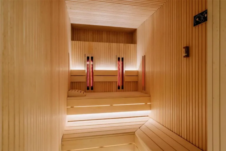 Sauna Room with Infrared Heating and Wooden Benches in Orchard Area