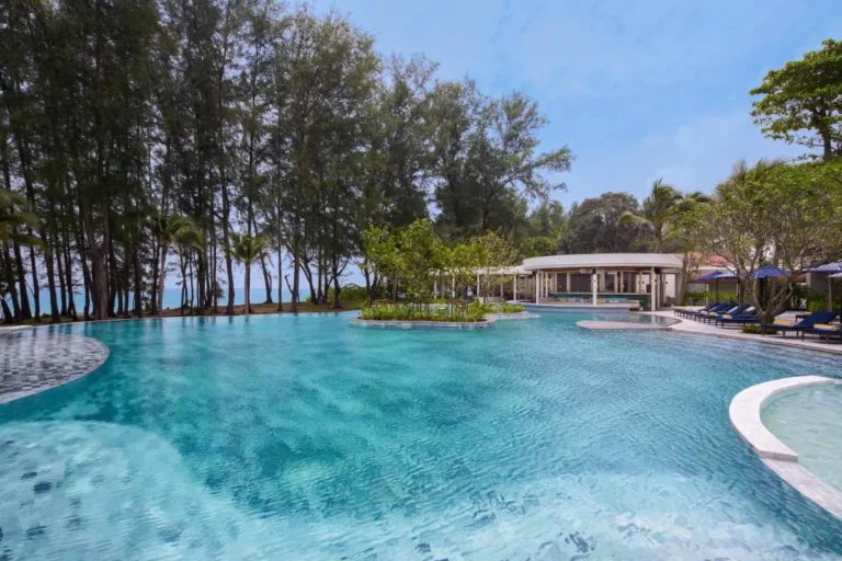 Scenic Outdoor Swimming Pool and Pavilion with Lounge Area at Mai Khao Beach
