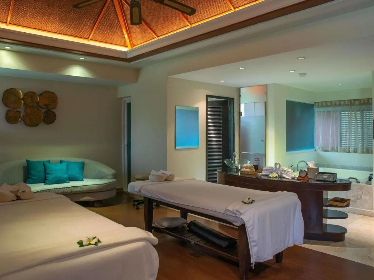 Serene Indoor Spa Room with Massage Tables and Jacuzzi at Panwa Beach