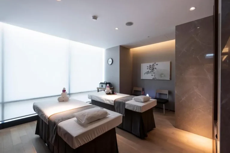 Serene Indoor Wellness Room with Massage Tables and Ambient Lighting in Wattana