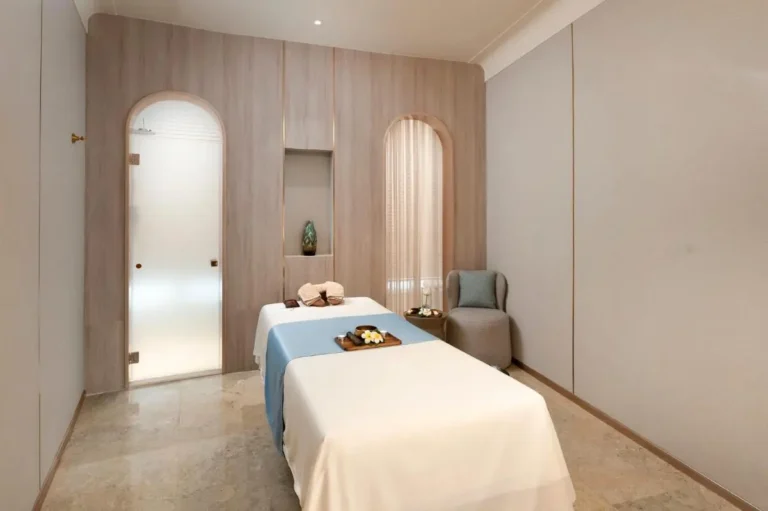 Serene Indoor Wellness Treatment Room with Massage Table in Pathumwan Bangkok