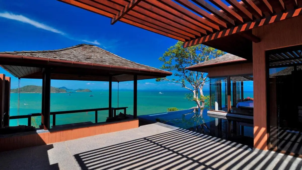 Serene Outdoor Terrace with Infinity Pool and Ocean Views at Panwa Beach
