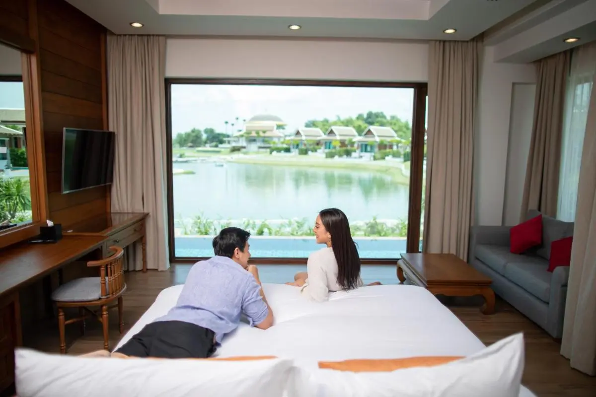 Thantara Resort Chiang Mai Serene Room with Water View and Comfortable Seating in Chiang Mai Resort