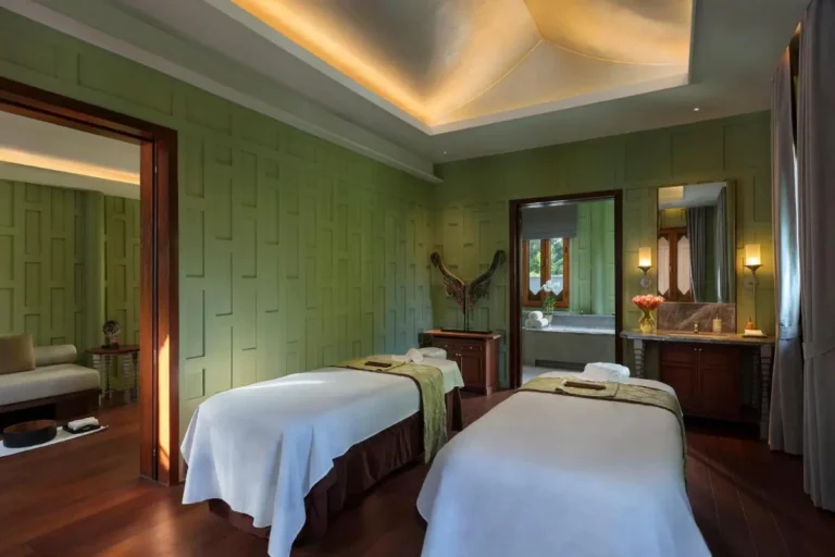 Serene Spa Room with Massage Tables and Stone Bathtub in Sathorn Bangkok