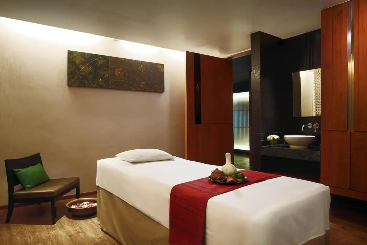 Serene Spa Treatment Room with Massage Table and Vanity in Sathorn Bangkok