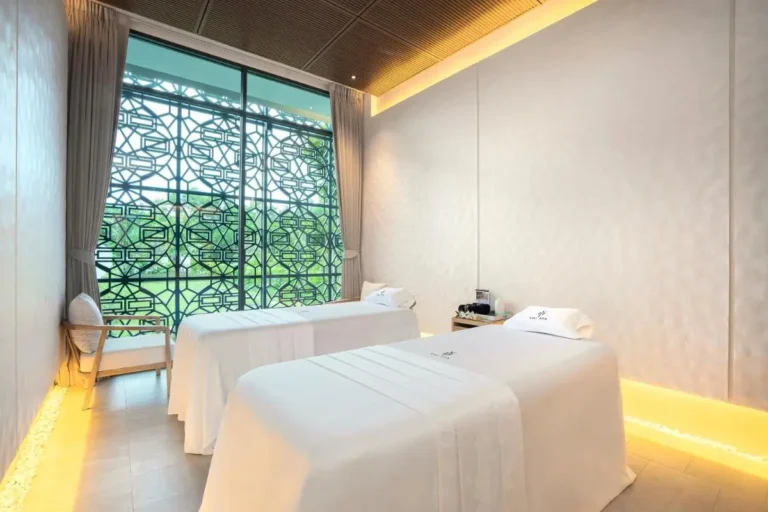 Serene Spa Treatment Room with Massage Tables and Garden View at Mai Khao Beach