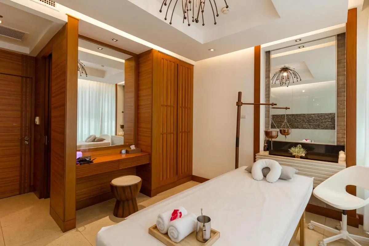 Serene Wellness Room with Massage Table and Traditional Treatment Setup in Wattana