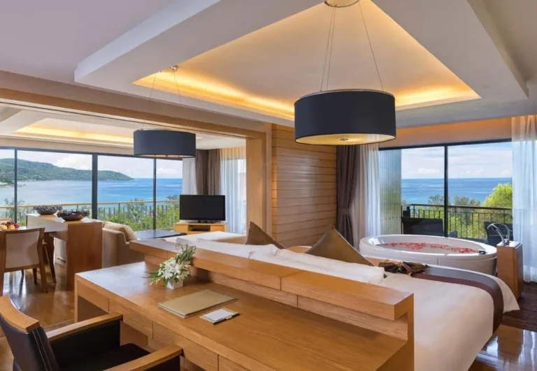 Spacious Coastal Room with Panoramic Ocean Views and Circular Bathtub at Kata Beach