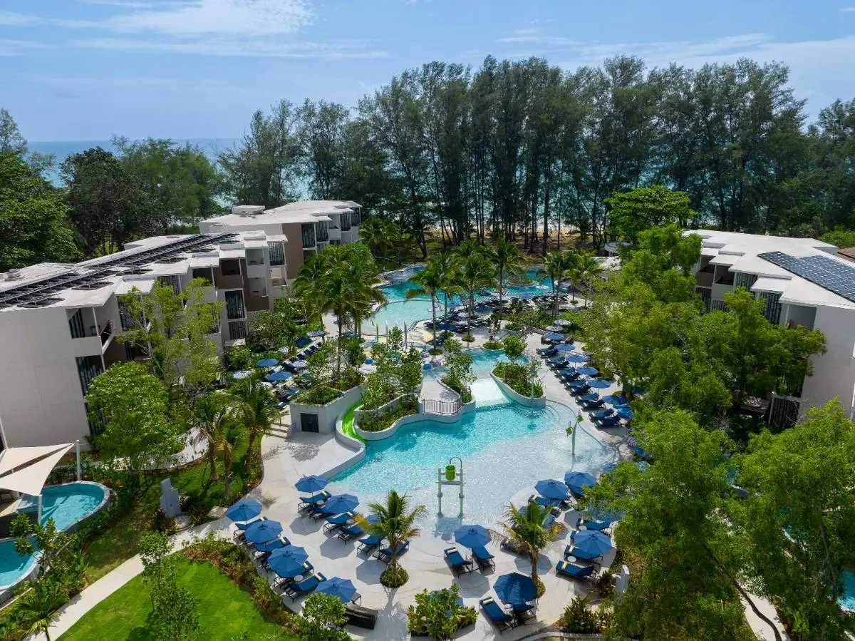 Le Meridien Phuket Mai Khao Beach Resort Spacious Interconnected Swimming Pools with Lounge Areas and Coastal Views at Mai Khao Beach Thailand