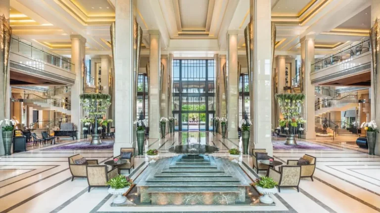 Spacious Lobby with Tiered Fountain and Outdoor Pool in Pathumwan Bangkok