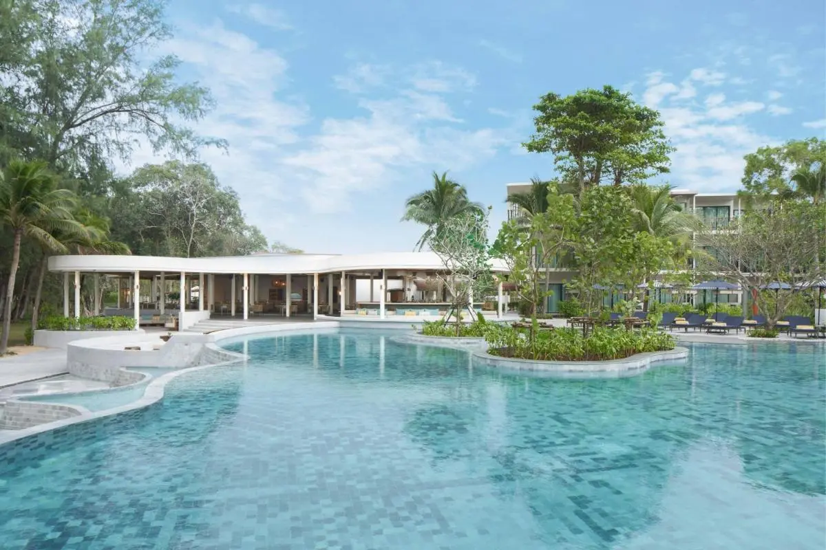 Spacious Outdoor Swimming Pool with Island and Lounge Area Near Mai Khao Beach