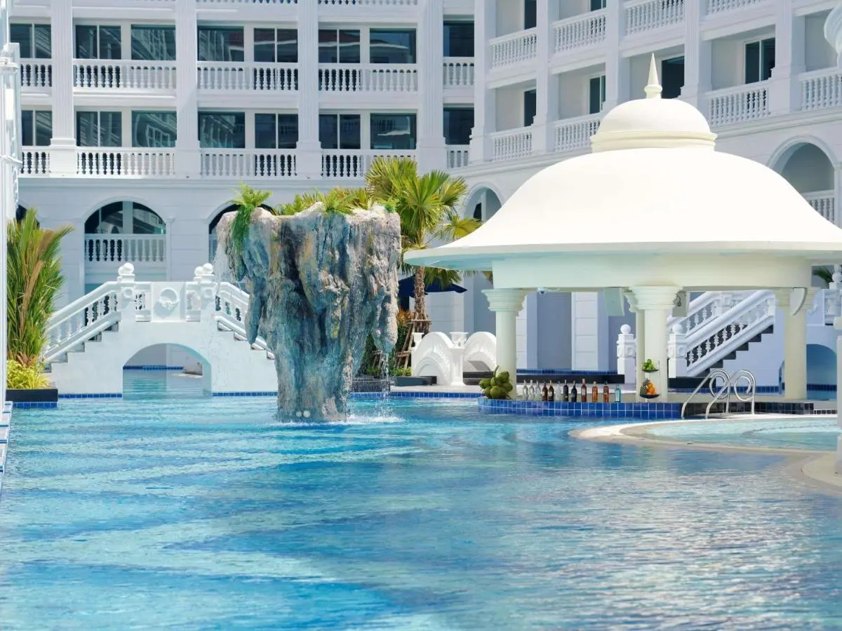 Mövenpick Myth Hotel Patong Phuket Spacious Outdoor Swimming Pool with Waterfall and Dome-Shaped Pool Bar at Patong Beach