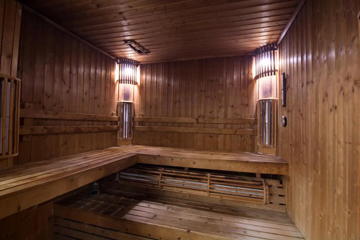 Rama Gardens Hotel Bangkok Traditional Wooden Sauna Room with L-Shaped Benches and Heating Element in Laksi Bangkok Province