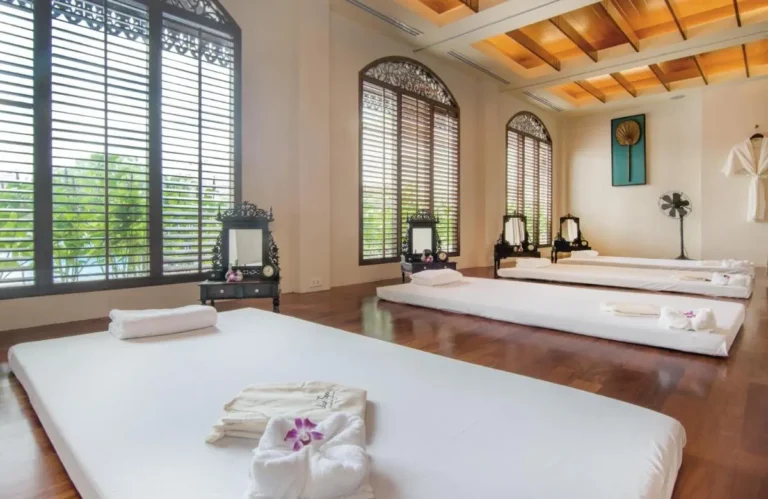 Tranquil Indoor Wellness Room with Massage Mattresses and Natural Light in Ratchathewi Bangkok