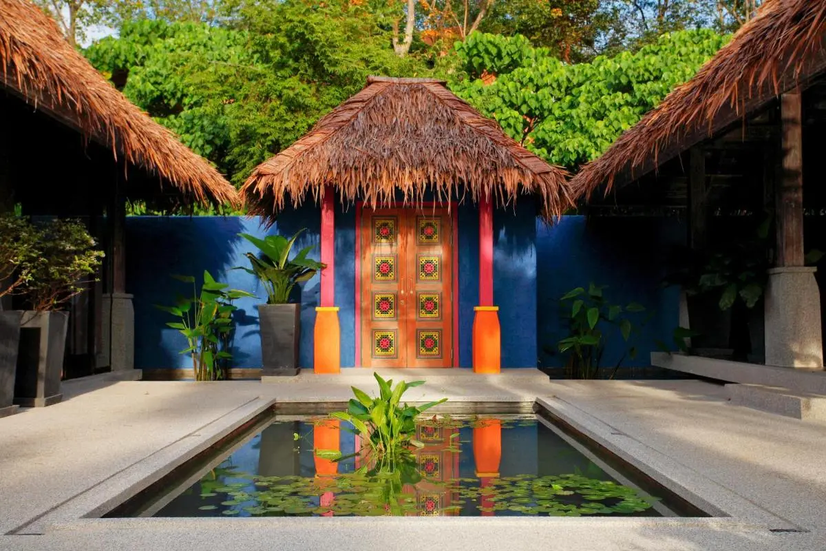 Sri Panwa Phuket Luxury Pool Villa Hotel Tranquil Outdoor Courtyard with Rectangular Water Pool and Thatched Roof Structure at Panwa Beach