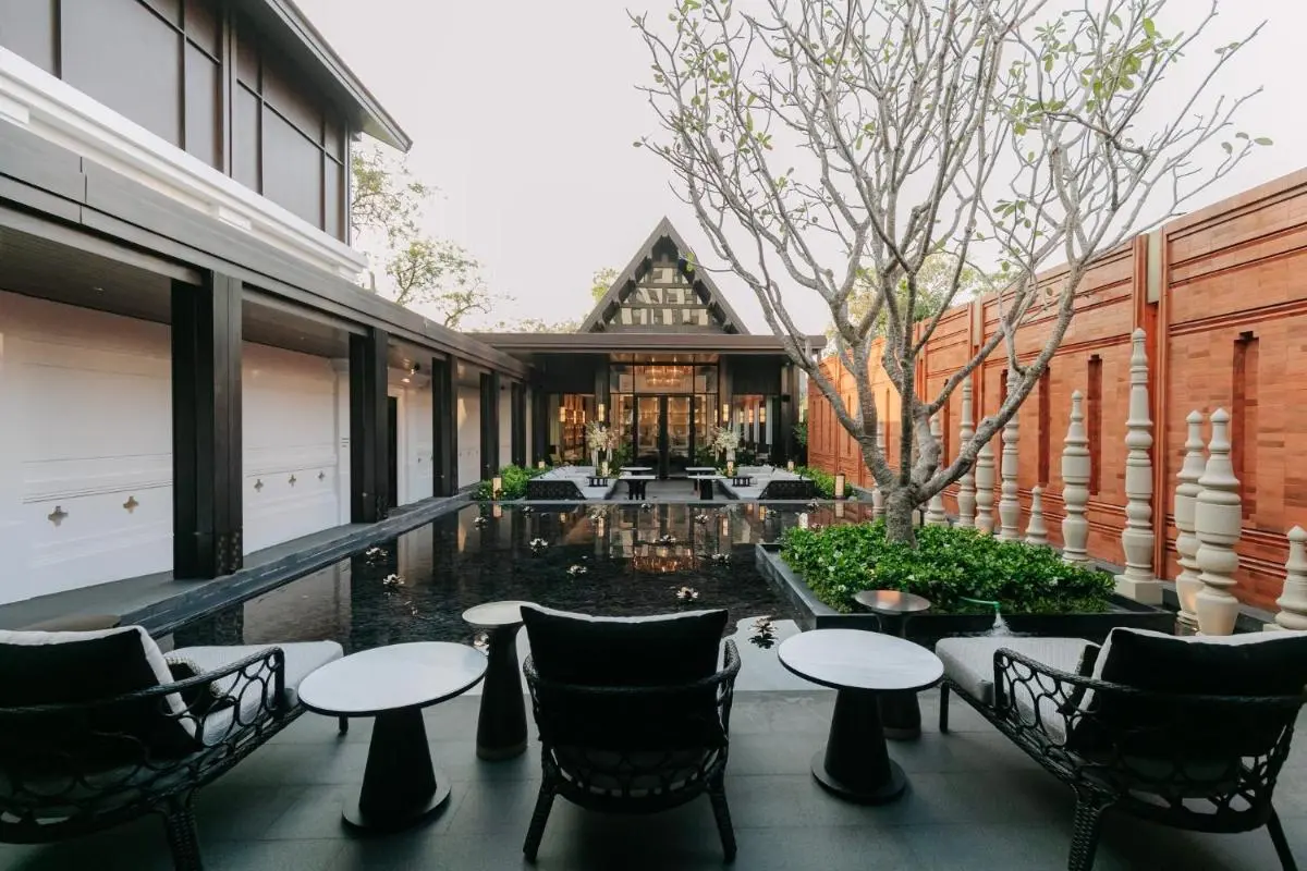 Chiang Mai Province Tranquil Outdoor Courtyard with Reflective Pool and Seating in Chang Khlan Chiang Mai