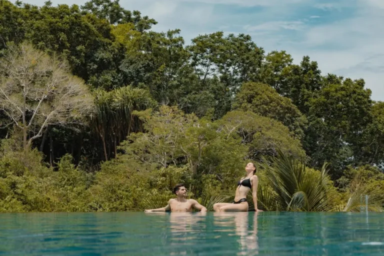 Tranquil Outdoor Infinity Pool Surrounded by Lush Greenery at Patong Beach