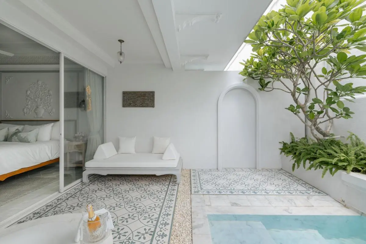 Tranquil Outdoor Pool and Seating Area with Planter in Phra Sing Chiang Mai